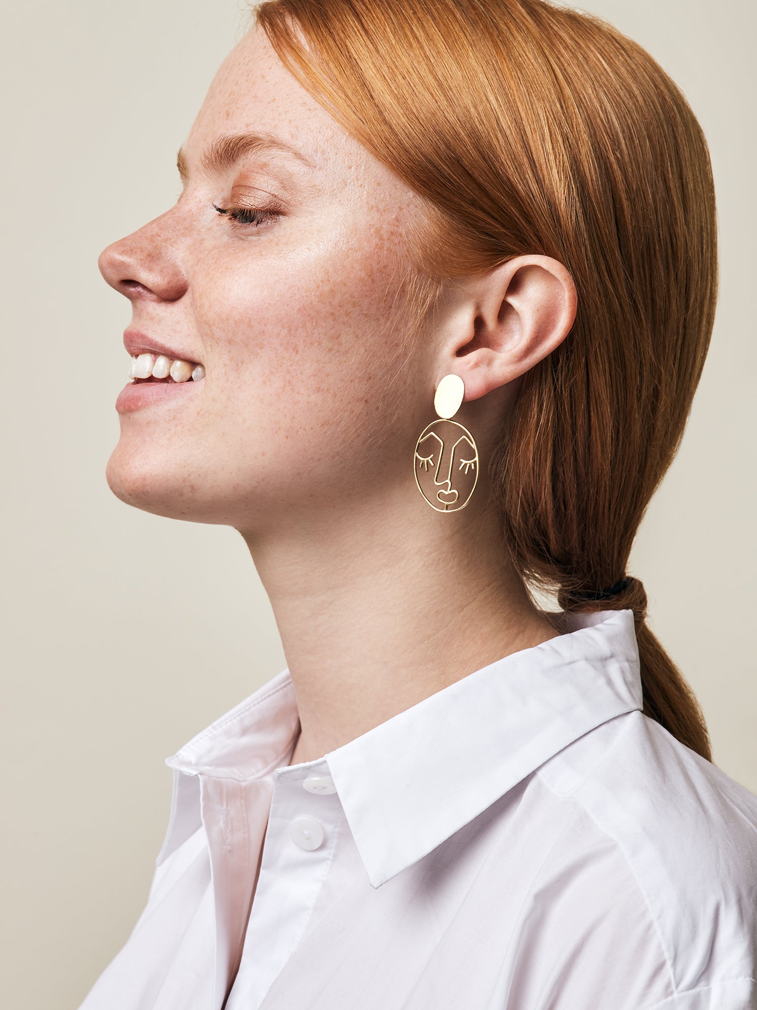 Face outlet earrings mango